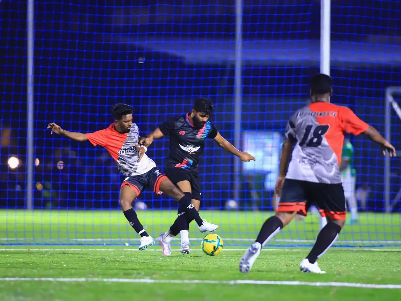 Taking on and evading two defenders at ArmourX Sports