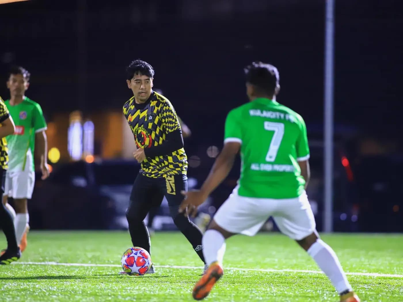 Beating the defender's grasp with the ball at ArmourX Sports