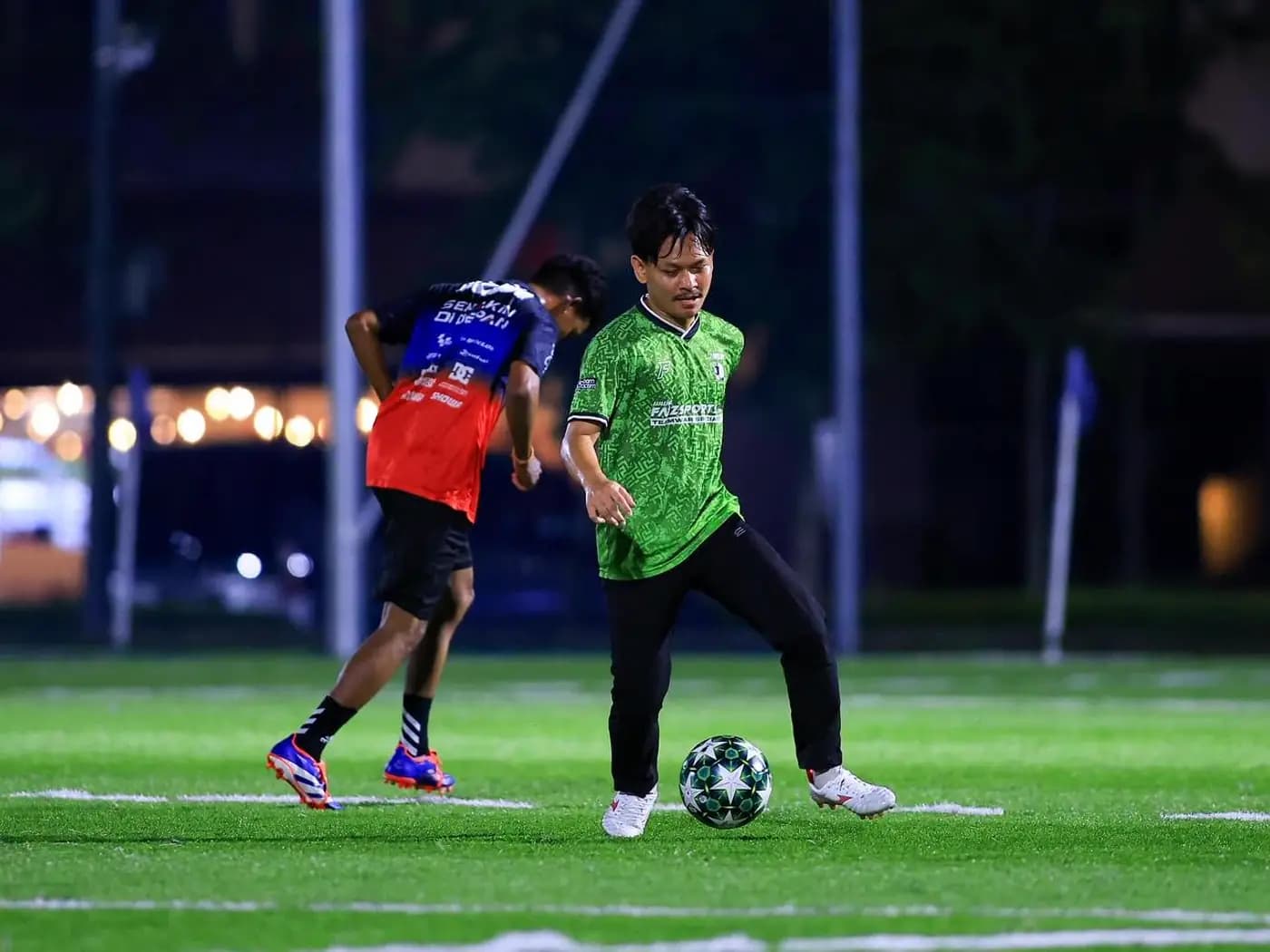 Dribbling clear of the defenders' grasp at ArmourX Sports
