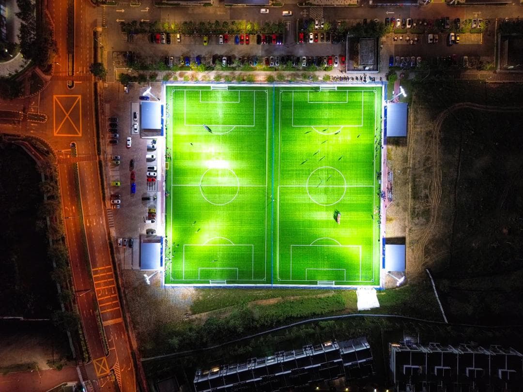 Direct perpendicular aerial view of the ArmourX Sports football pitch complex in Iskandar Puteri